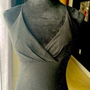 Fitted black dress with shiny black sparkle design
